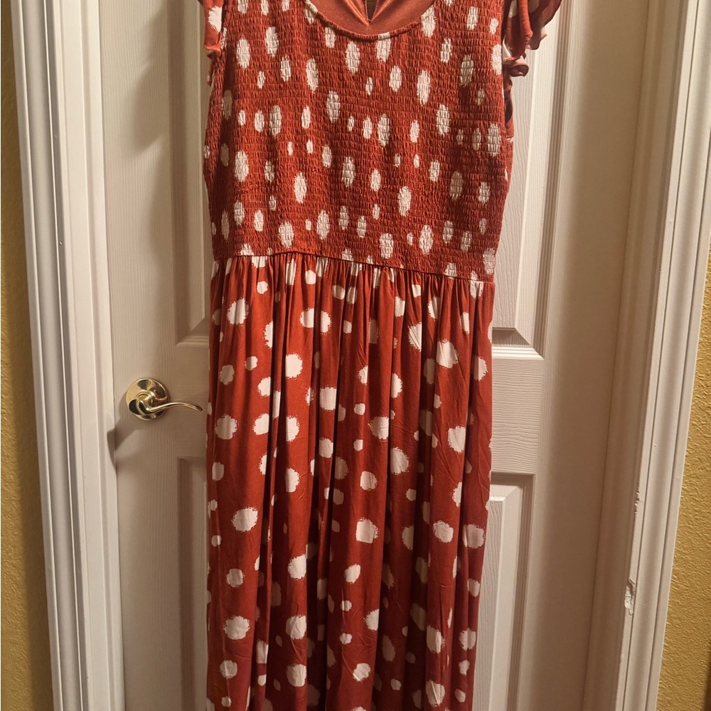 Avenue Orange Dress with Polka Dots and Flutter Sleeves.